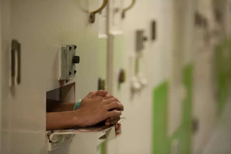 jjm_hands_incarcerated