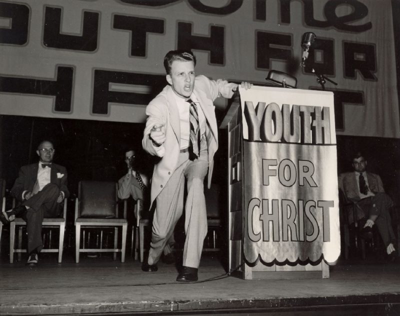 Billy_Graham_preaching_at_Youth_For_Christ_event
