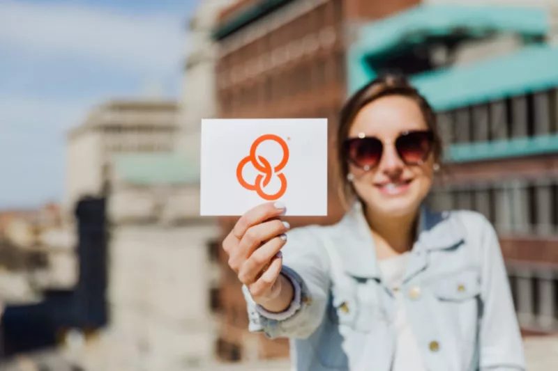 Person_holding_YFC_logo